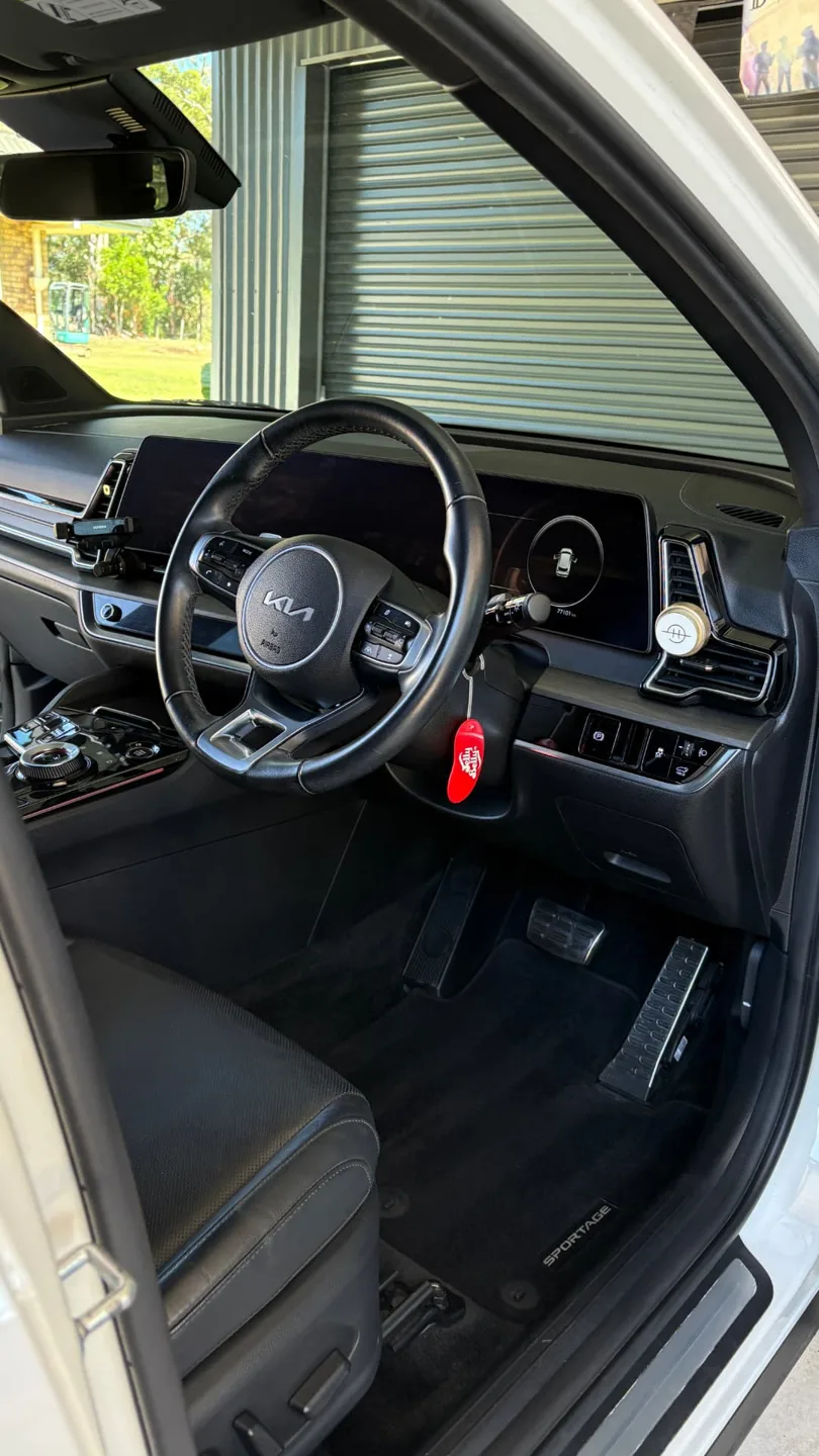 Kia interior with clean seats and floor mats